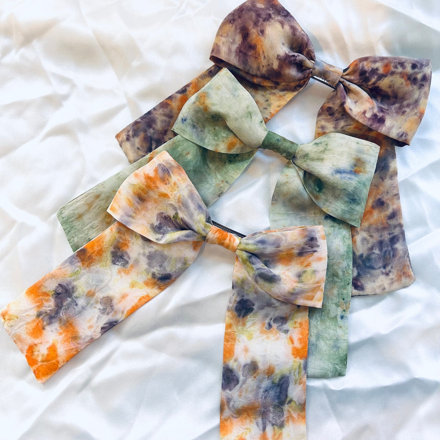 3 silk hair bow clips with various multicoloured natural dyed print