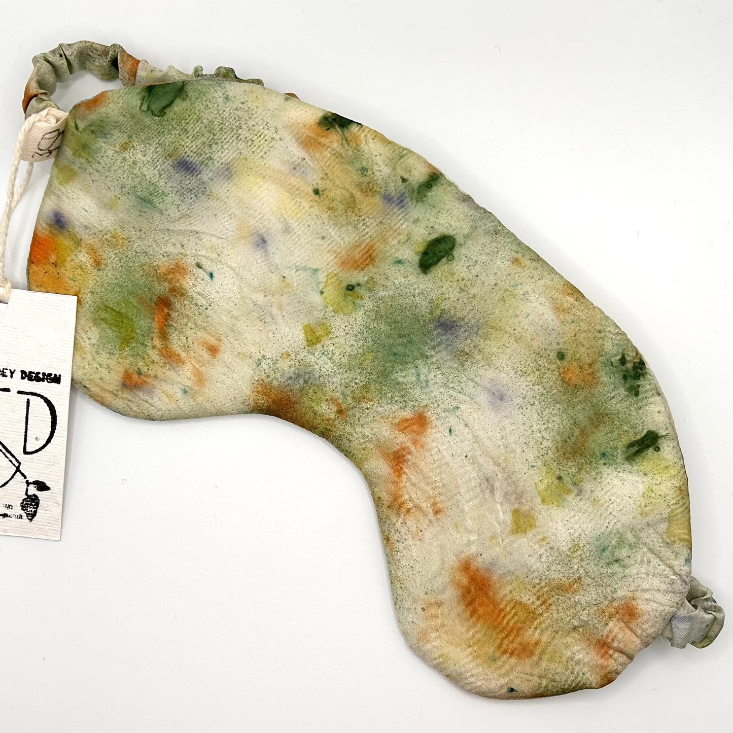 Pale green meadow naturally dyed silk printed eye mask with elastic to secure over eyes