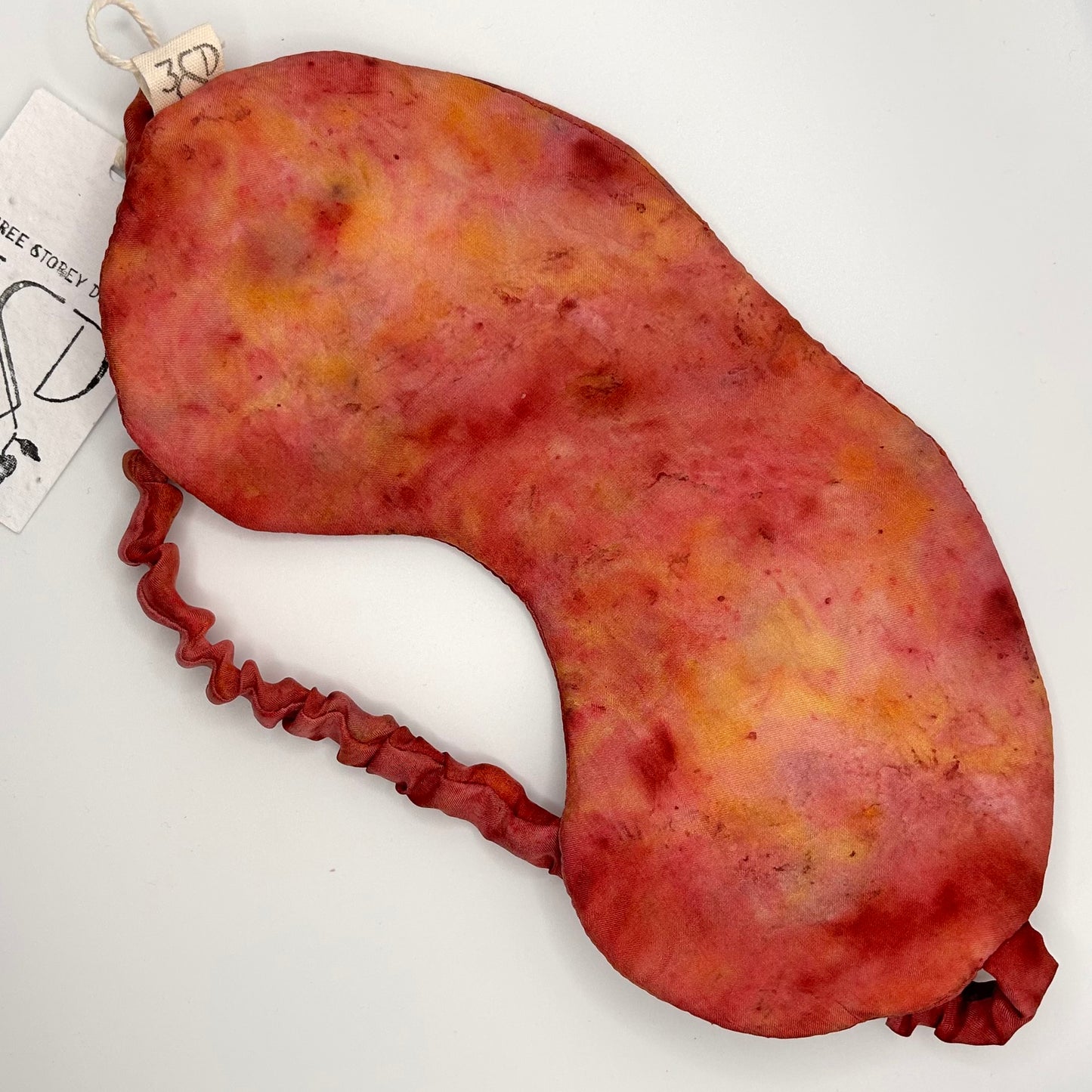 Red and orange cosmos flame naturally dyed silk printed eye mask with elastic to secure over eyes