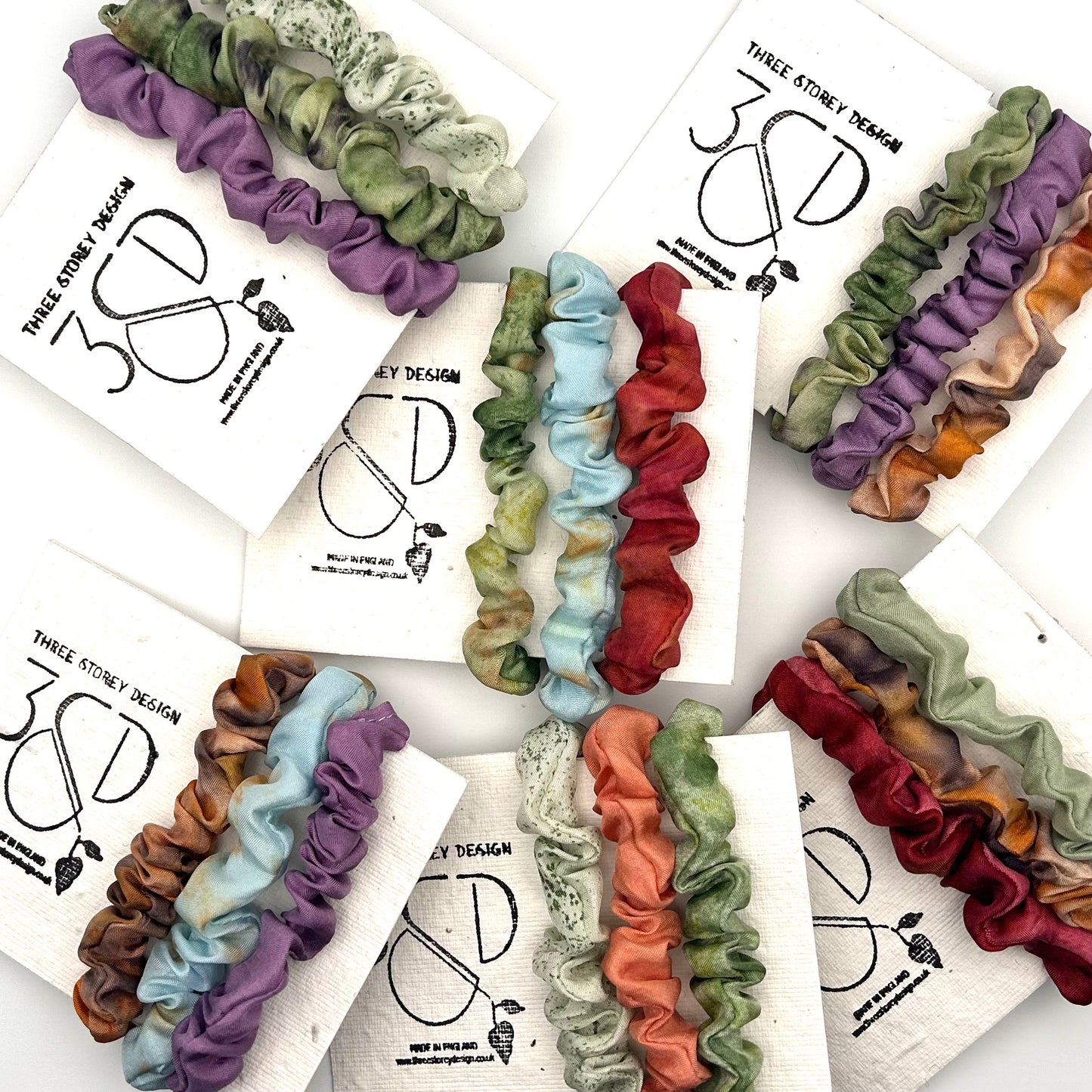 Various scatted 3 pack mini silk scrunchies, 3 colourways per pack