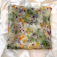 Green garden spring naturally dyed  silk square scarf  folded into a square