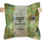 Green Silk square lavender bag/sachet with Naturally dyed purple pansy and orange cosmos print and cotton branded tab, wrapped in tracing paper product information sleeve