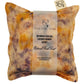Orange Silk square lavender bag/sachet with Naturally dyed  orange cosmos and black bean print and cotton branded tab, wrapped in tracing paper product information sleeve