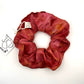 Red Silk Scrunchie naturally dyed with orange cosmos and marigold flowers