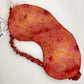 Red and orange cosmos flame naturally dyed silk printed eye mask with elastic to secure over eyes
