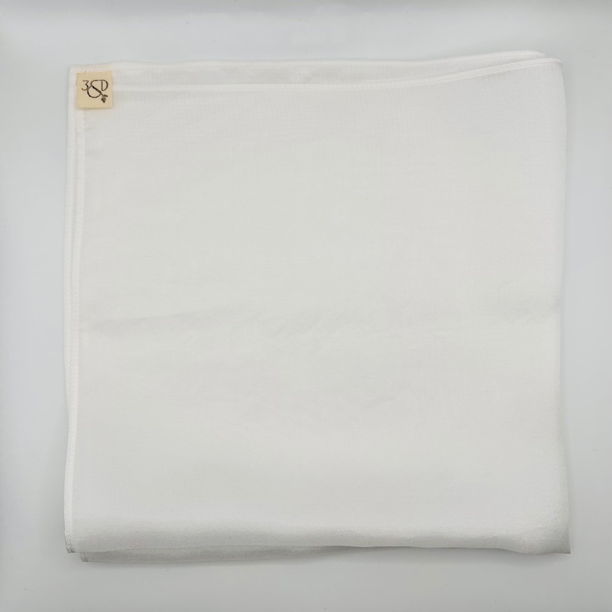 White silk wedding pocket square with branded cotton tab, prepare to naturally dye folded into a square