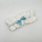 Front view of White Silk wedding garter with adjustable Indigo blue tied bow, ready to wear 